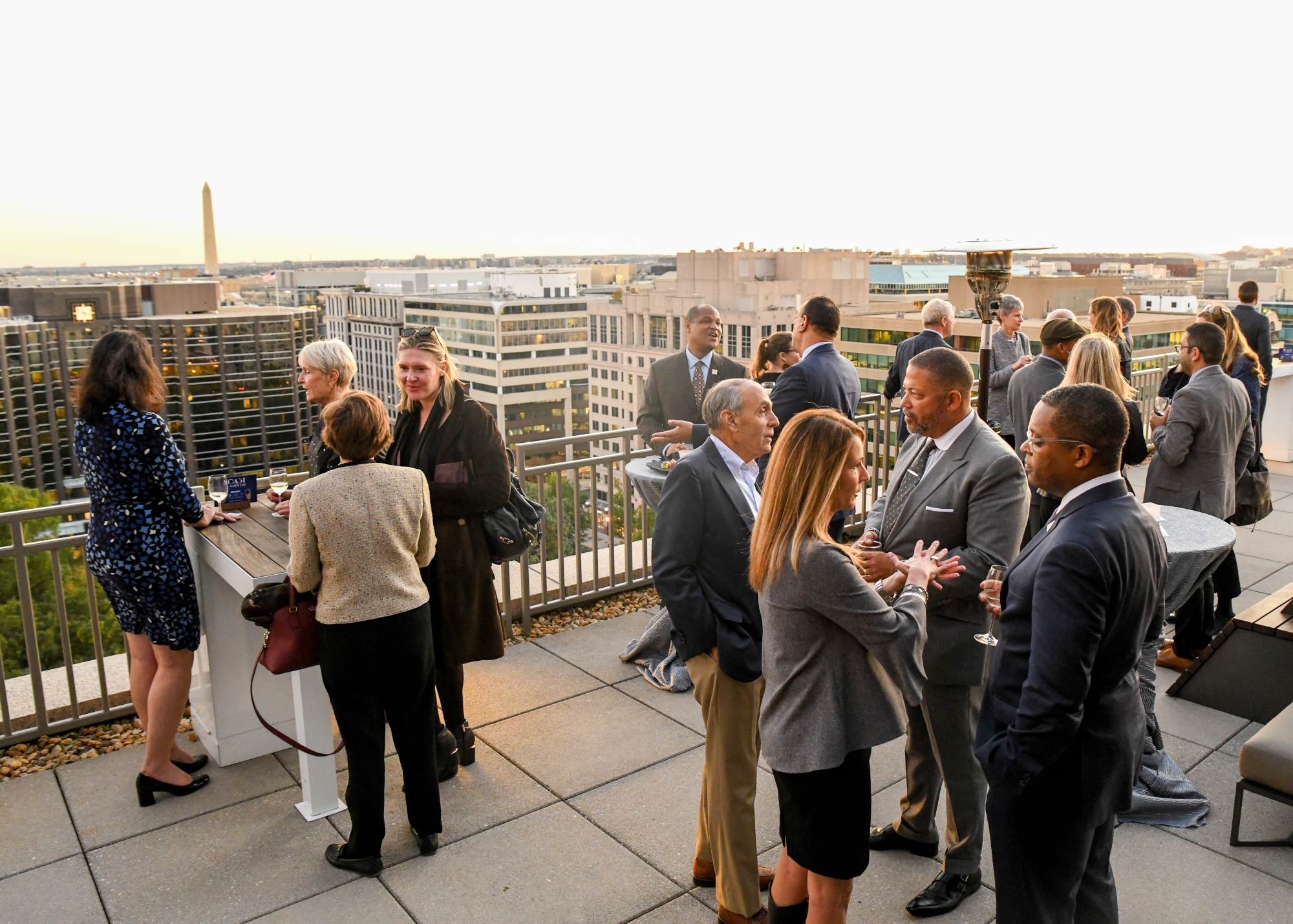 Patrons at a rooftop reception